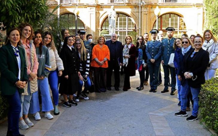 Family photo in the cloister of the Monastery of Los Jerónimos after the conference