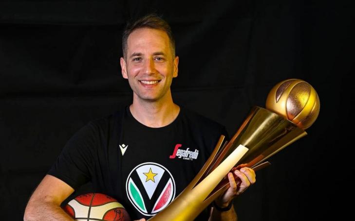 Mladen raising the cup.