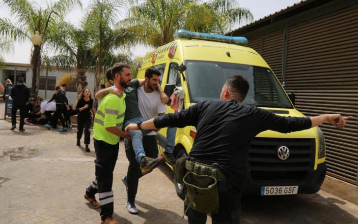 UCAM students take part in a drill with Army medics