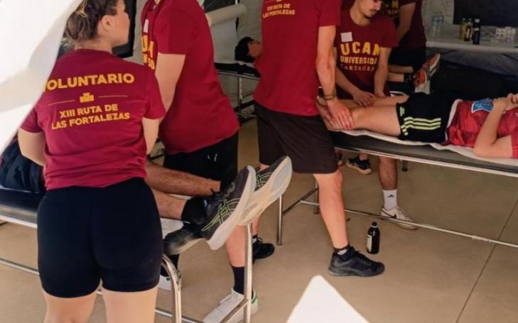 UCAM Students assisting participants