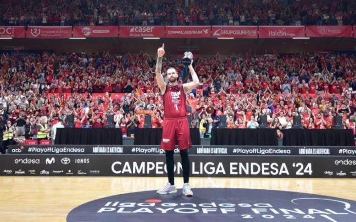 UCAM Murcia CB captain Nemanja Radovic lifts the Endesa League 2023/24 runner-up trophy