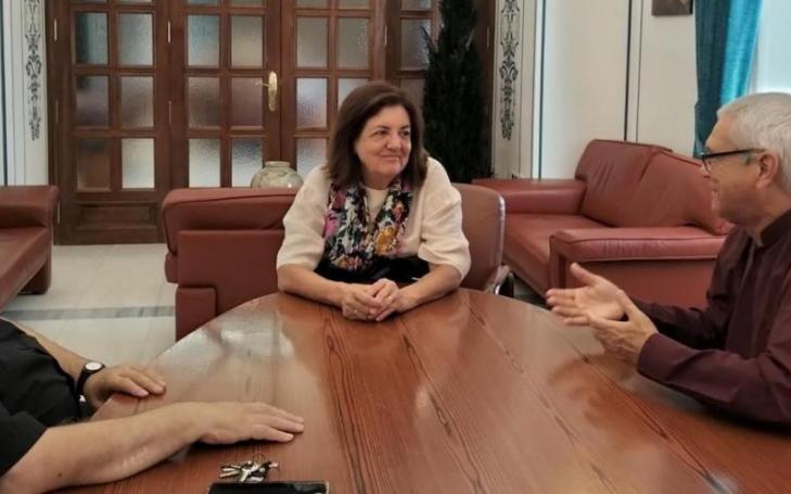 María Dolores García, meeting with Armando Rangel (right), and Antonio Alcaraz