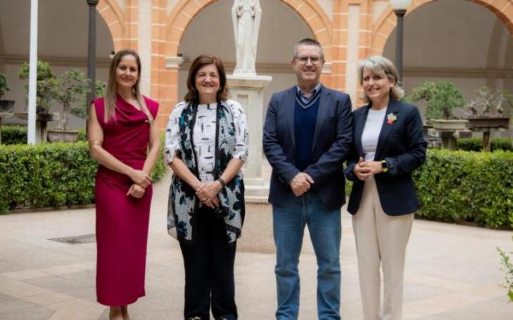The researchers pictured with the President of UCAM and the Vice-Rector for Research.