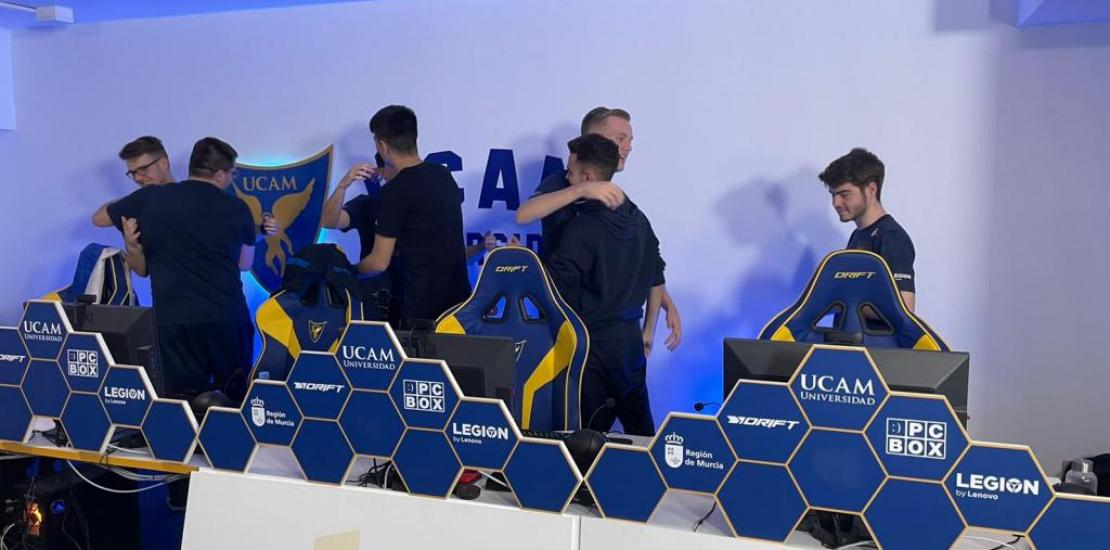 The `UCAM Esports' team celebrating the victory