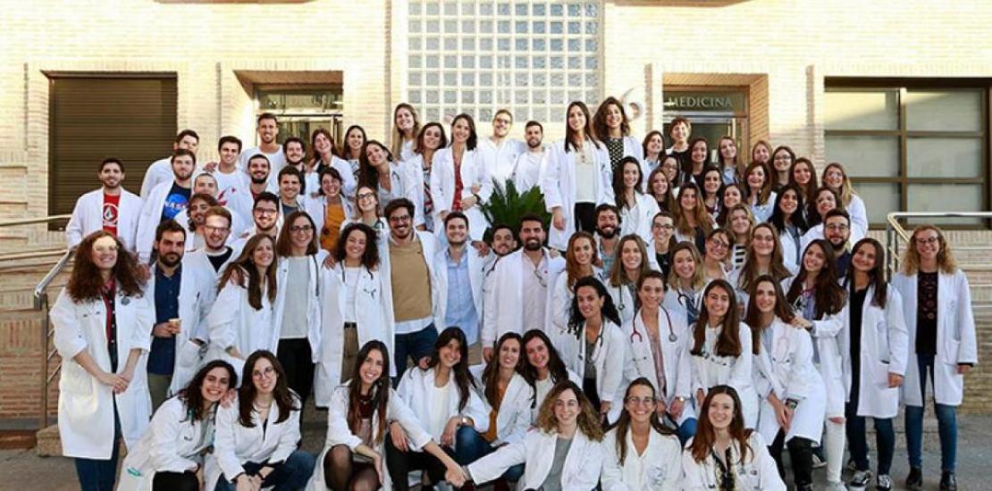 UCAM medical graduates in front of the UCAM building (stock image, February 2020).