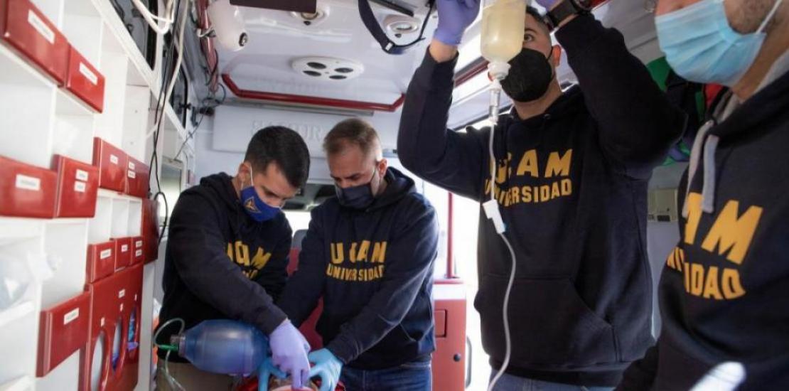 Manuel Pardo (2nd left) and Yasell Parra (3rd left) together with two other UCAM professors preparing the equipment they will use in Uganda.