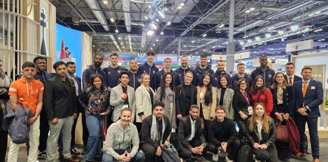 Tourism students and lecturers at the Universidad Católica Murcia together with the UCAM CB basketball team.