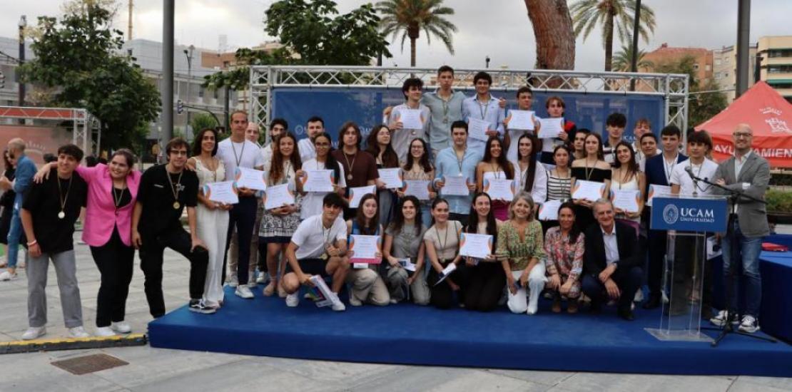 The winners of the UCAM Science Olympiads with their awards
