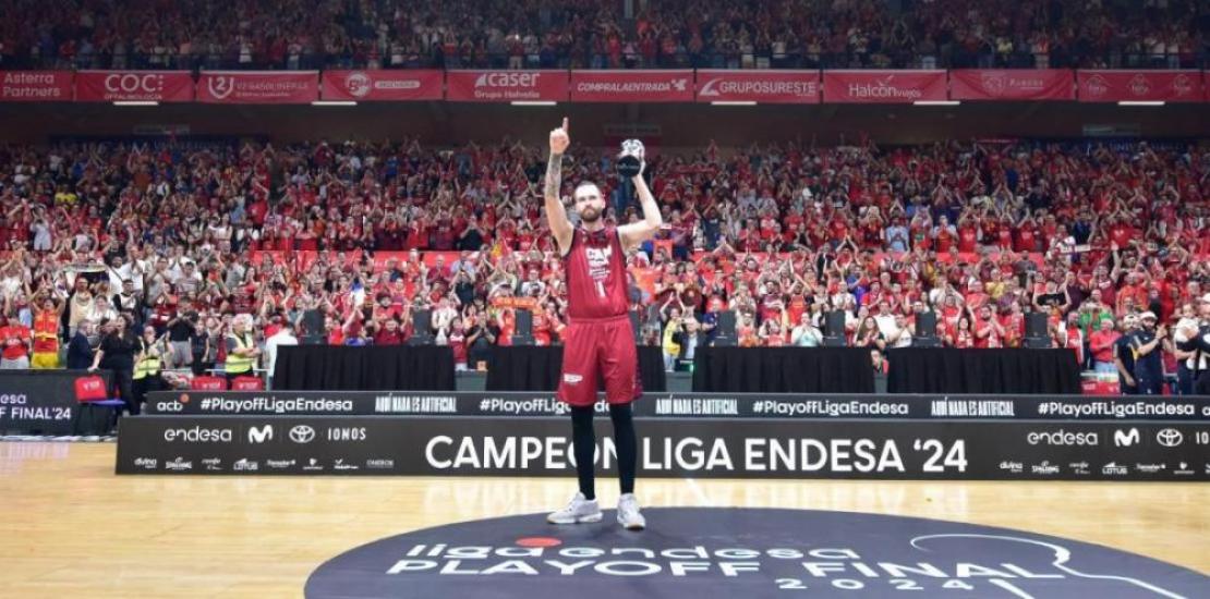 UCAM Murcia CB captain Nemanja Radovic lifts the Endesa League 2023/24 runner-up trophy