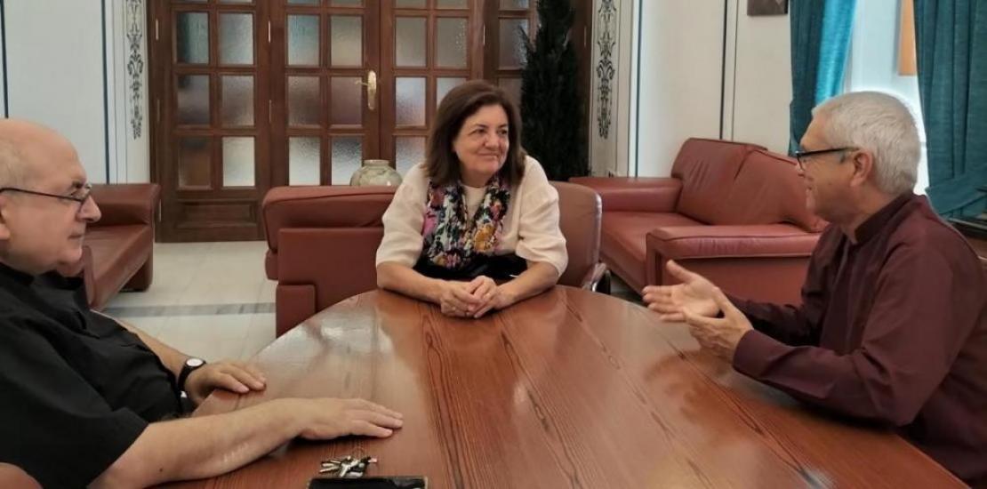 María Dolores García, meeting with Armando Rangel (right), and Antonio Alcaraz