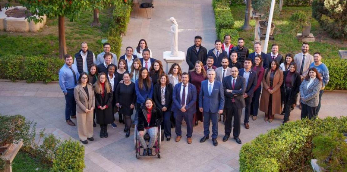 Participants in the UCAM international delegates' meeting with María Dolores García, UCAM president.