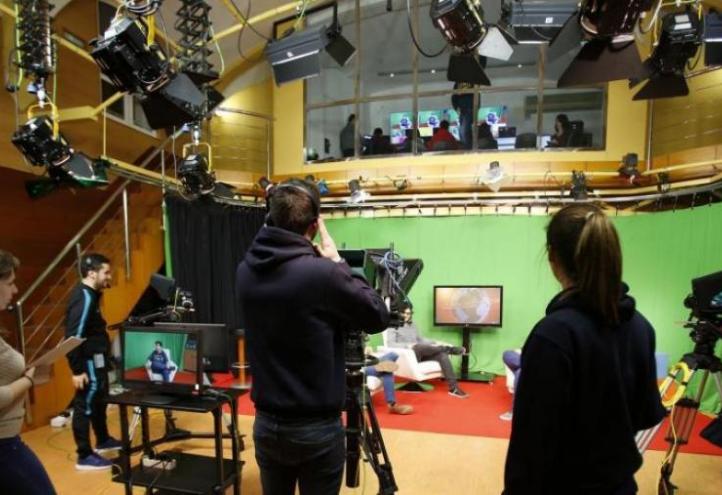 Library picture of students undertaking an internship in the Radio and Television Studio of the Faculty of Social Sciences and Communication