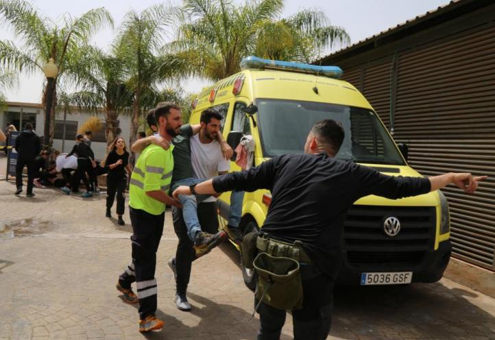 UCAM students take part in a drill with Army medics