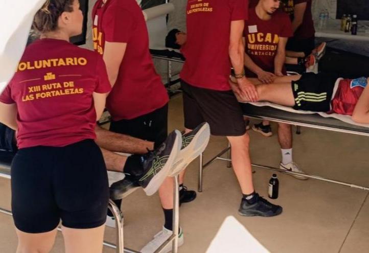 UCAM Students assisting participants 