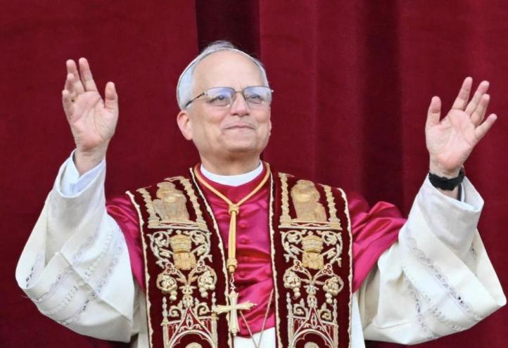 Pope Leo XIV greeting the faithful gathered in St. Peter&#039;s Square.