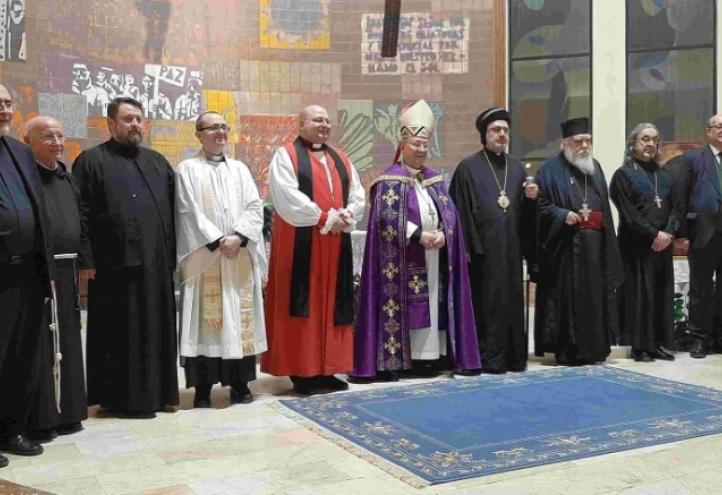 The representatives of different Christian denominations participate in an event of ecumenical prayer